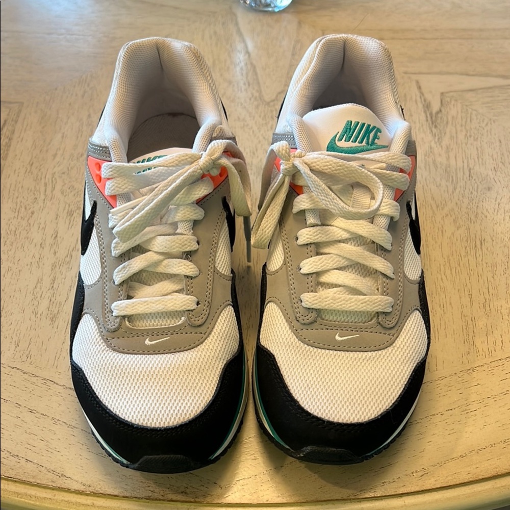 Nike White, Black, and Gray Sneakers with Neon Highlights